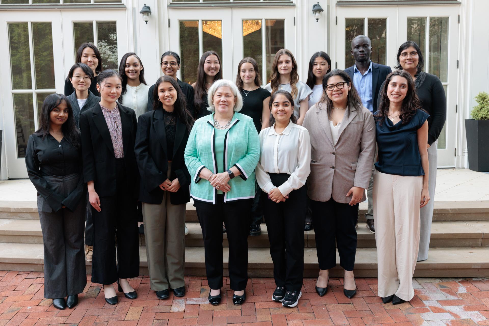 2025 HIPP cohort taking photo with President Granberg