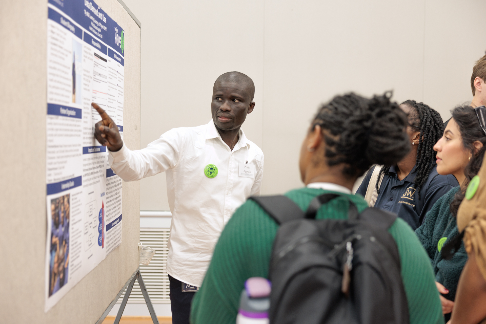 HIP intern shares poster to student body.