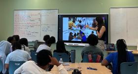 Ari speaking to about middle school students about what being a changemaker means to her.